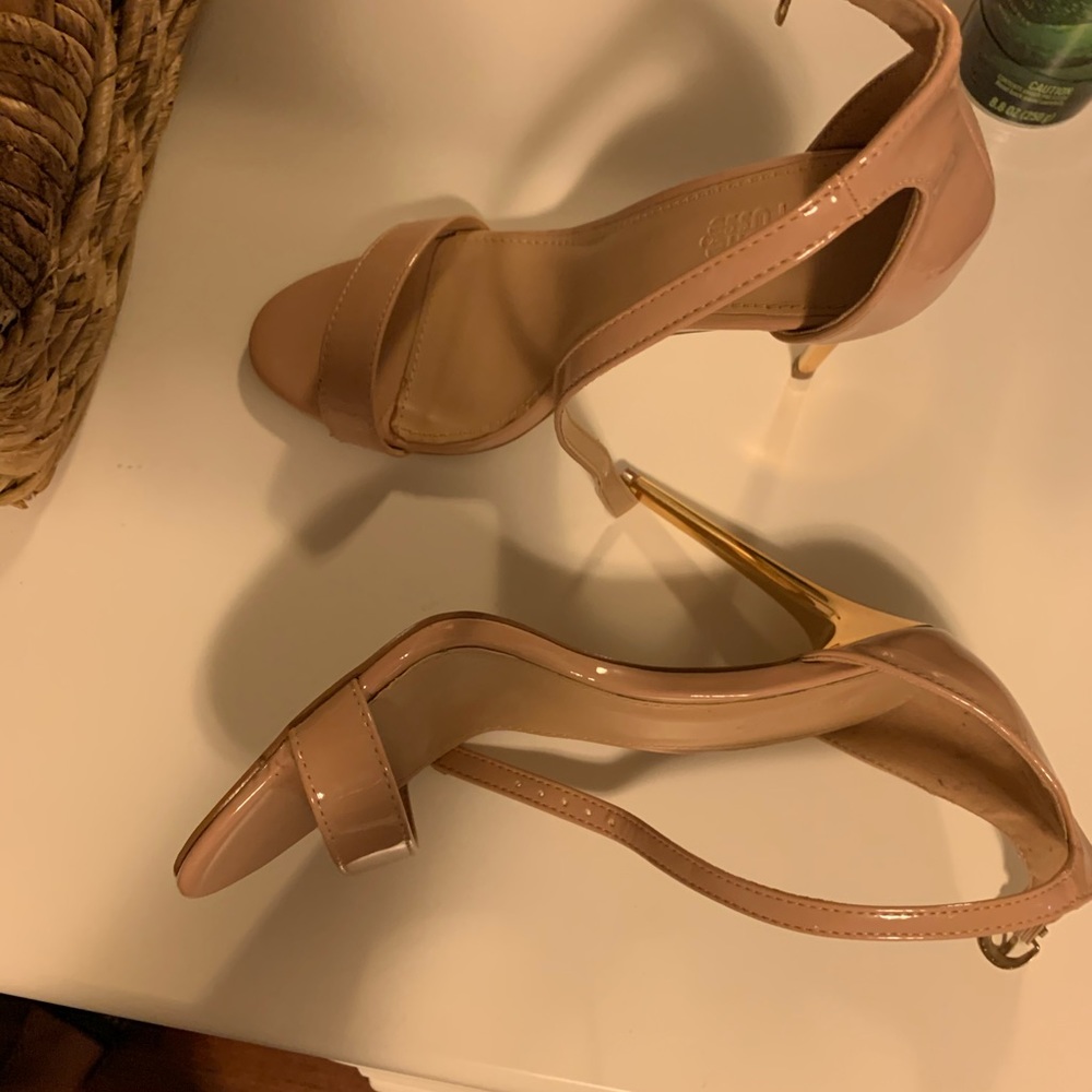 Nude with gold heel.